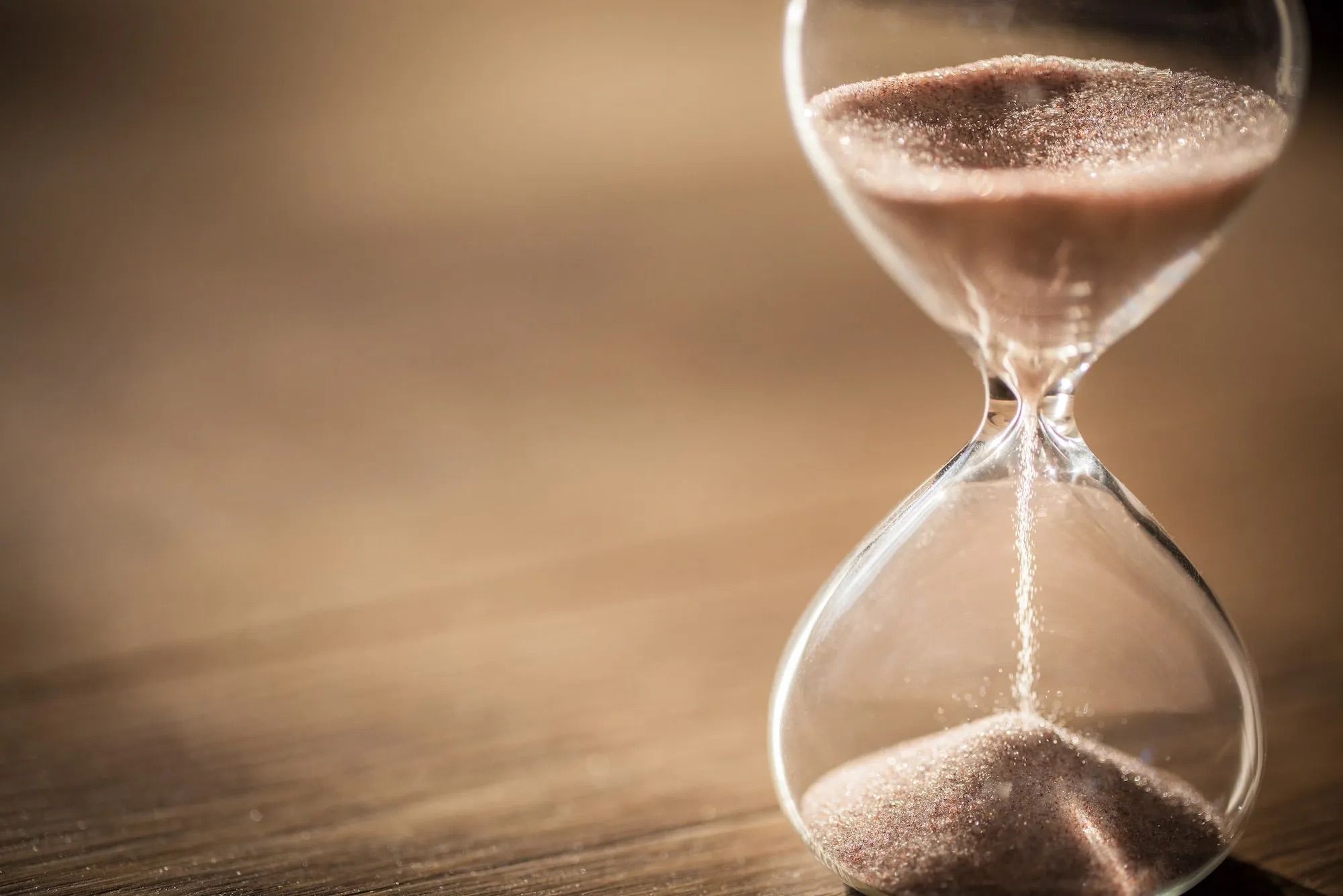 Hourglass showing passage of time during sourdough fermentation process