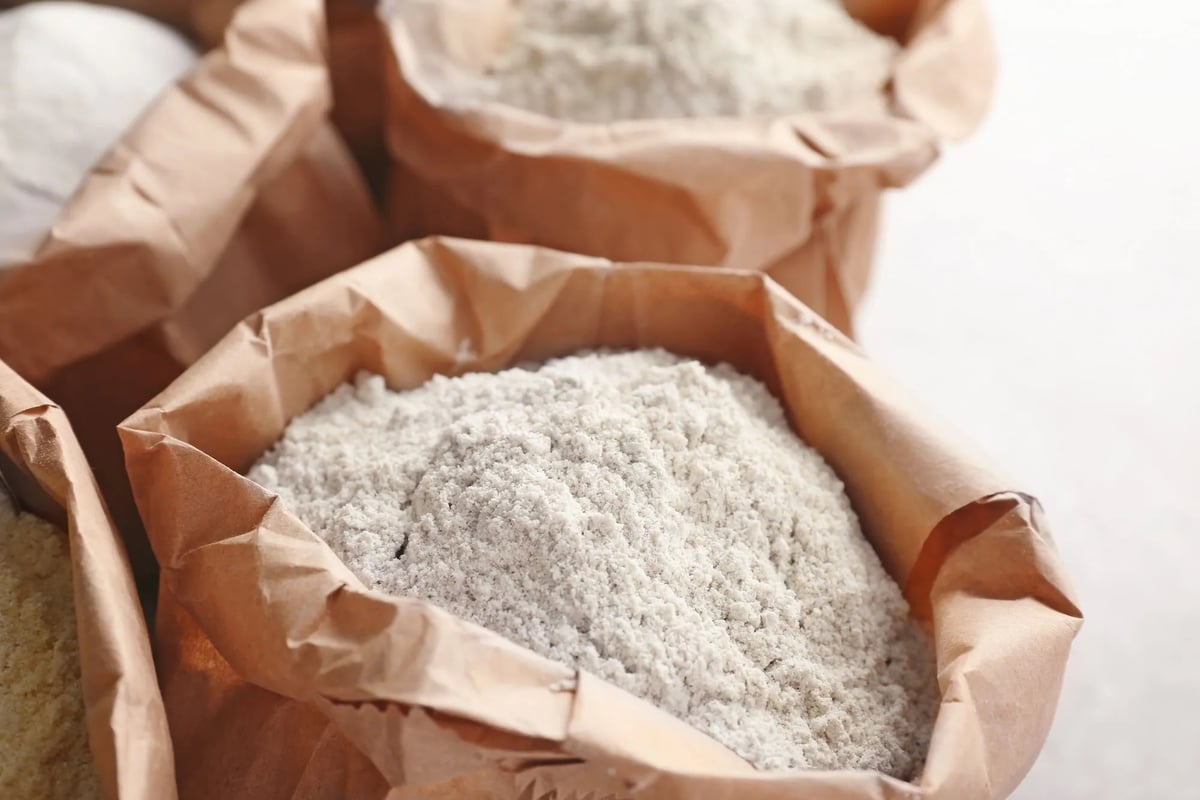Bags of stone-ground bread flour for sourdough starter and baking