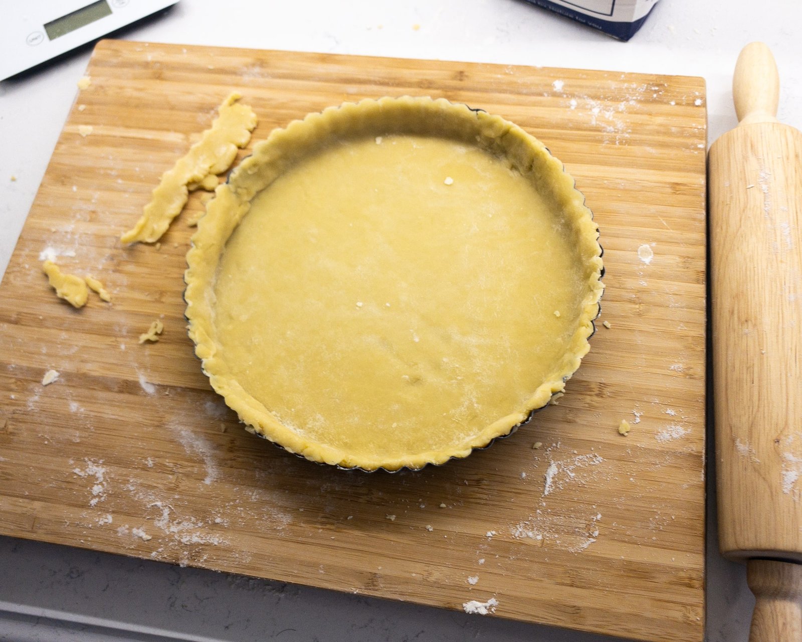 Tart tin lined with pastry ready for filling